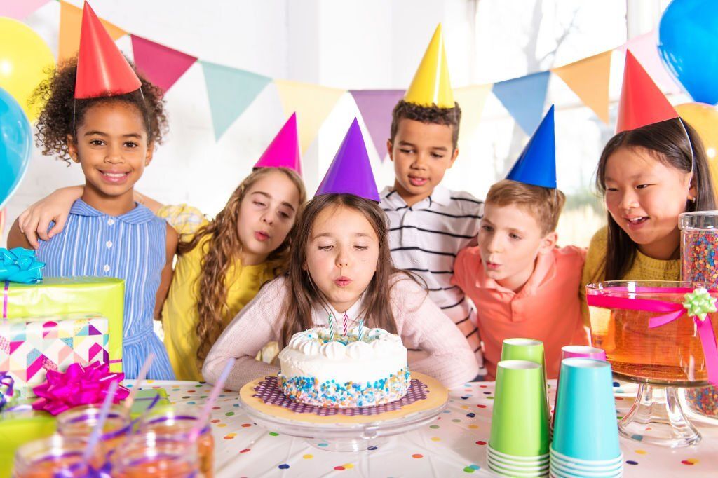 A group of children at birthday party at home